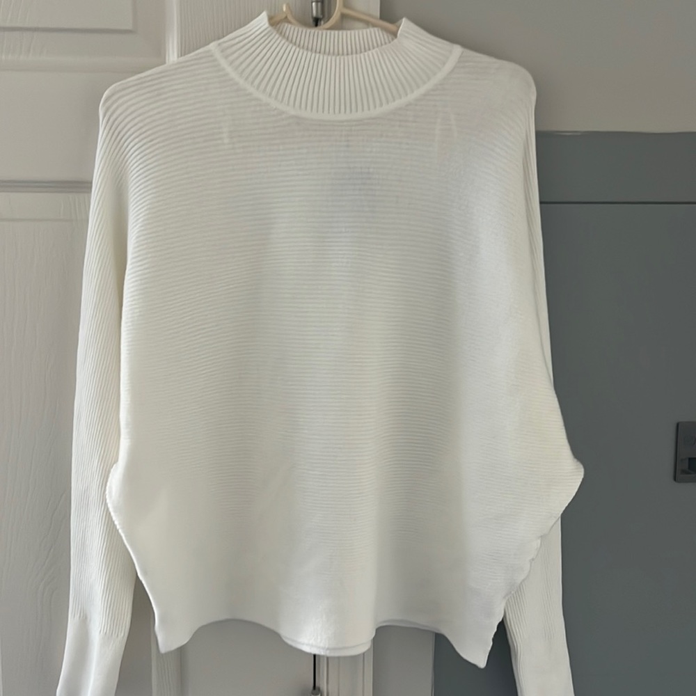 White turtleneck sweater